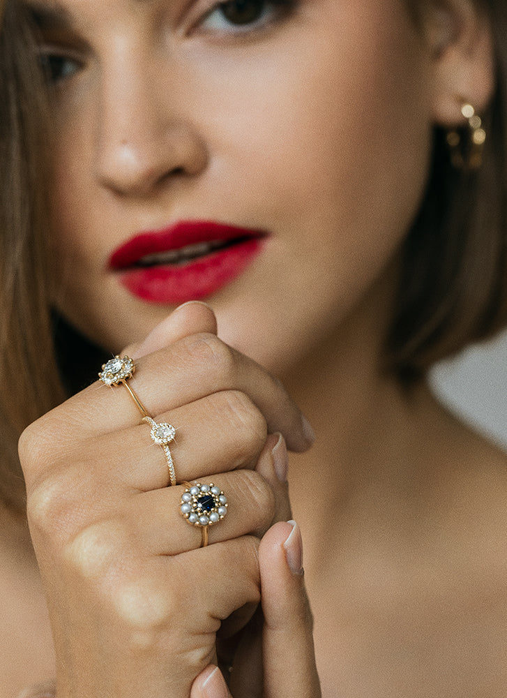 Sapphire and store pearl engagement ring